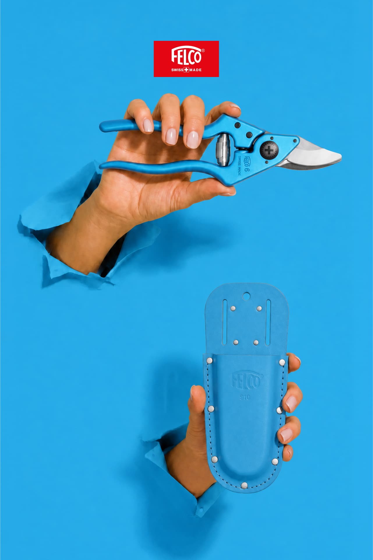 Blue FELCO 6 and matching holster breaking through paper