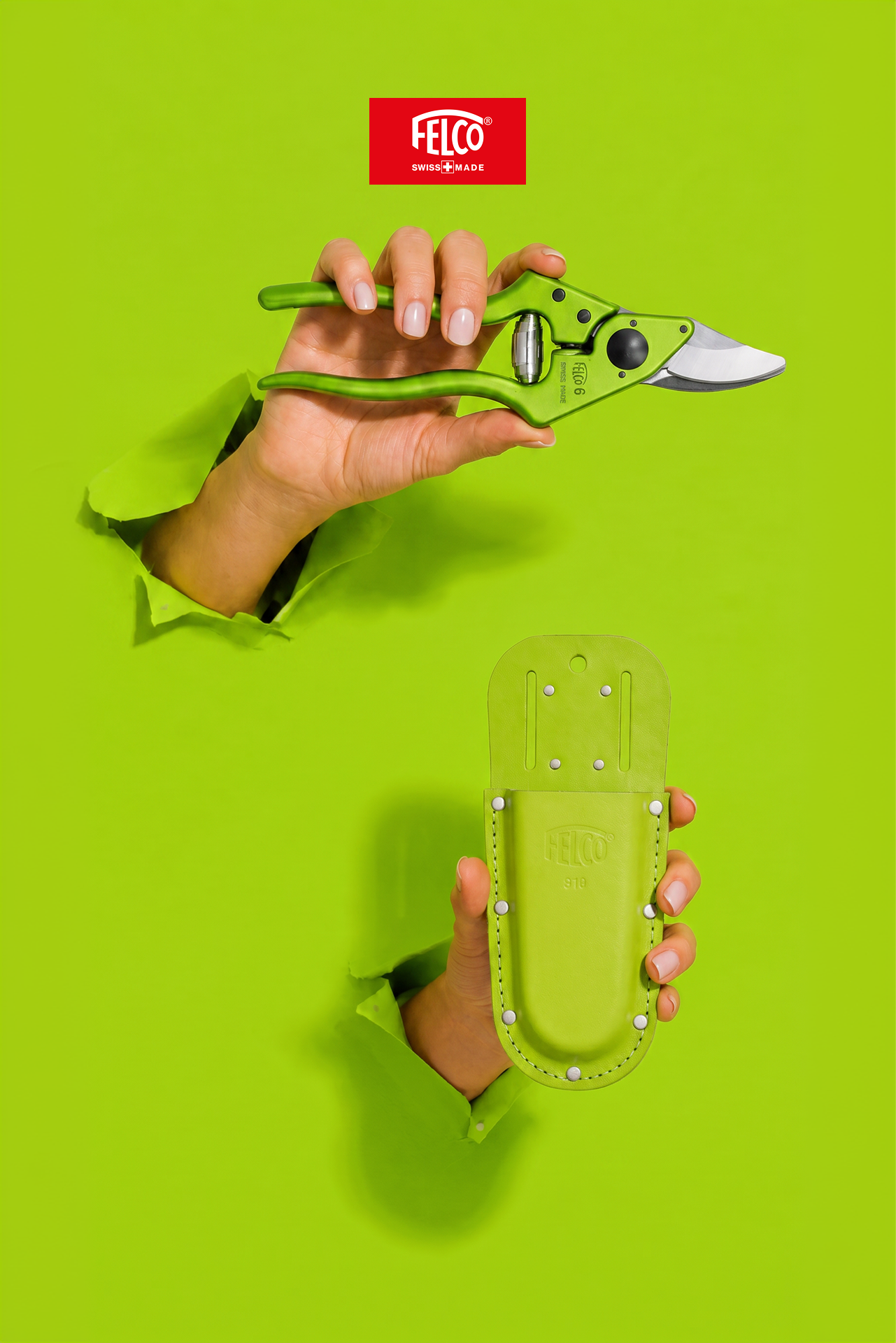 Green FELCO 6 and matching holster breaking through paper